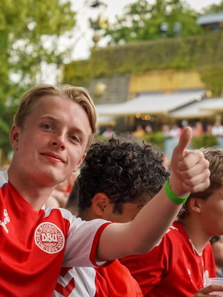 Two young players giving a thumbs up after the whistle