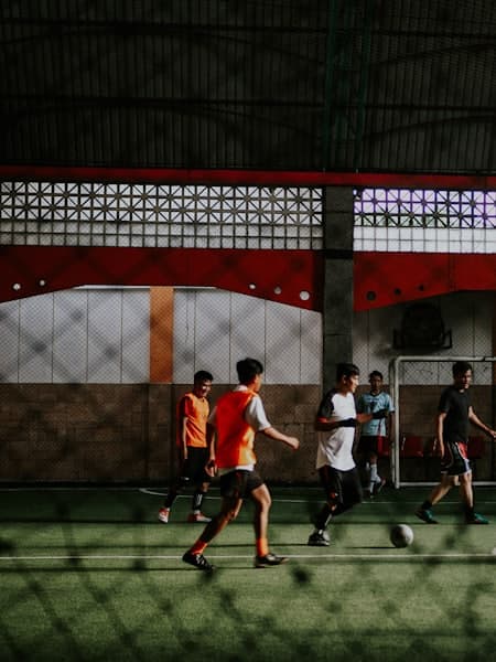 Five-a-side match on an indoor court