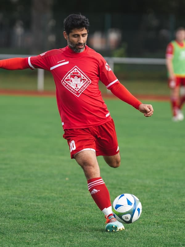 Player number 10 striking the ball