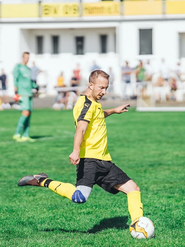 Striker shooting during a match